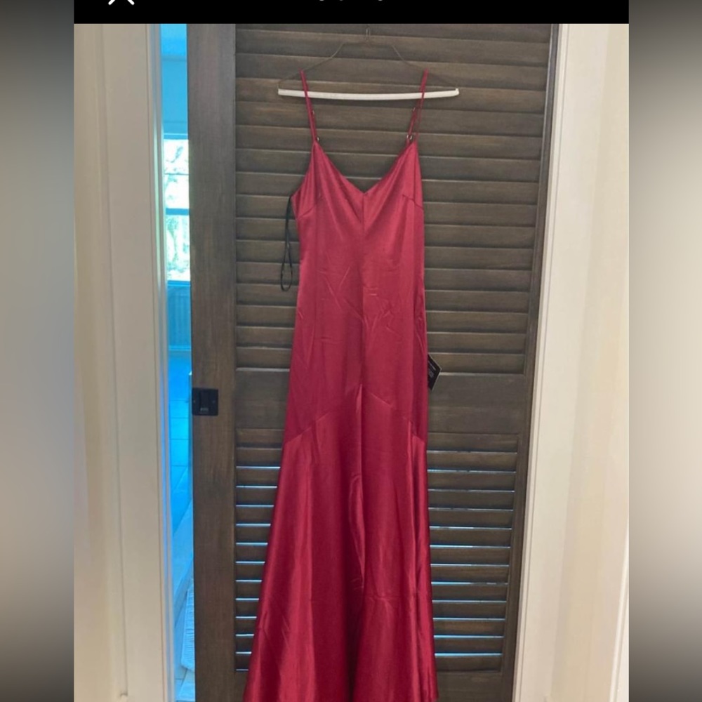 Luke’s red satin dress